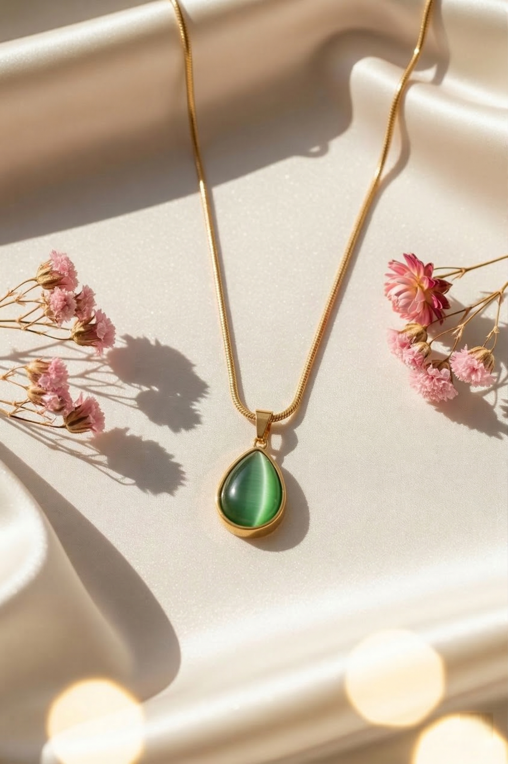 Emerald Glow Teardrop Pendant